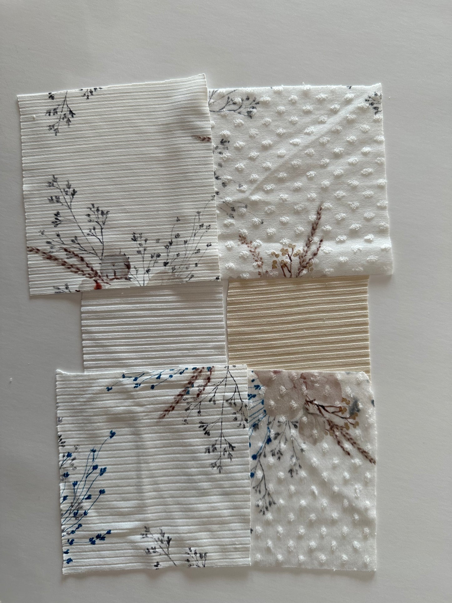 The Christmas Rose in Blue on Swiss Dot Knit Fabric Sold by the 1/4 yard