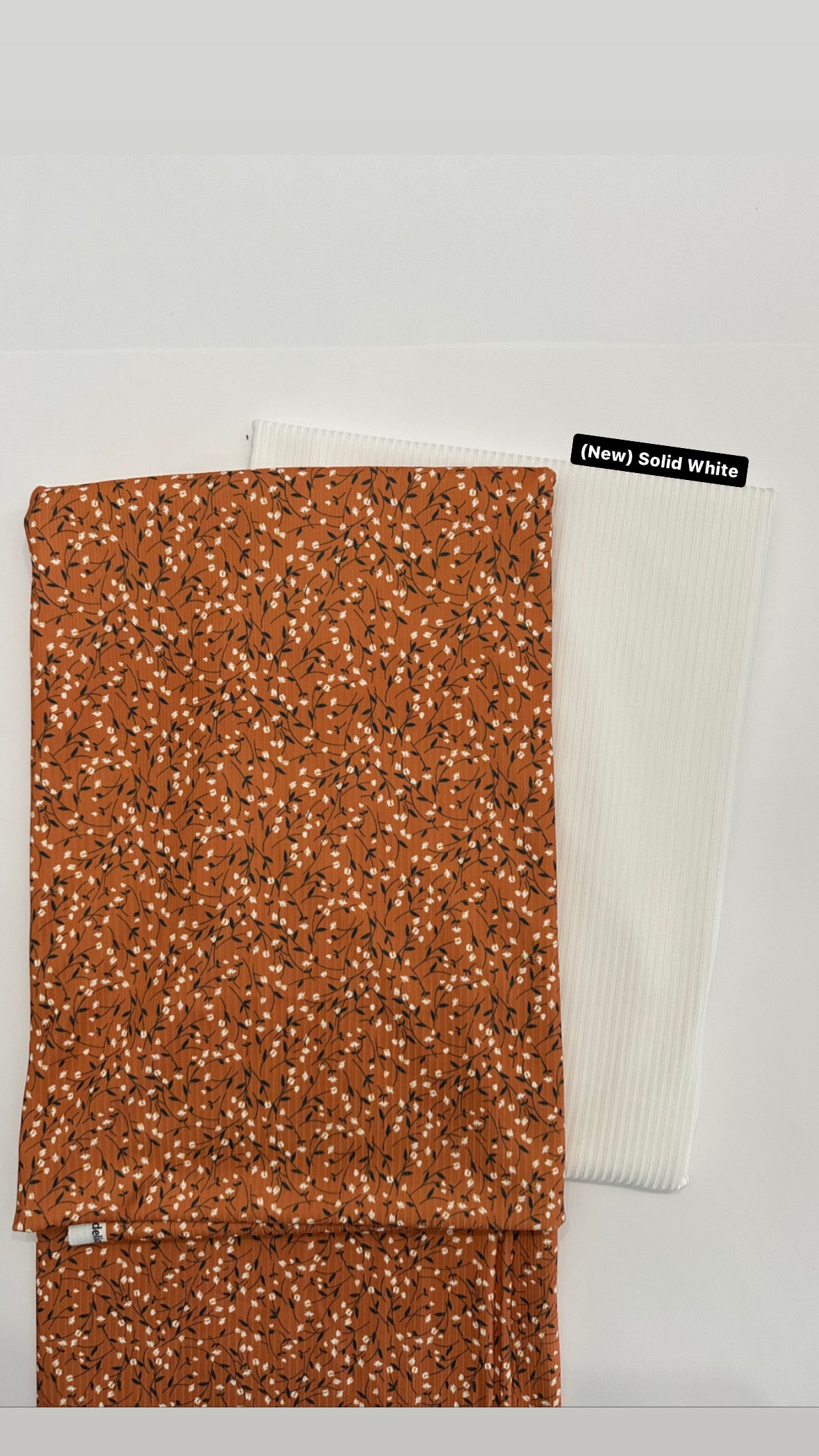 Naomi Floral in Orange Rust on Unbrushed Rib Knit Fabric Sold by the 1/4 yard