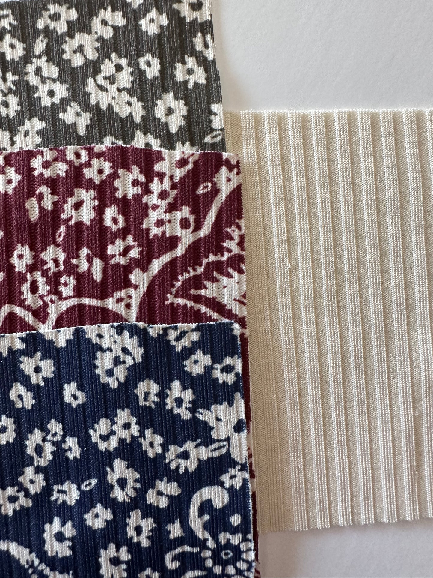 Paisley Toss in Navy on Unbrushed Rib Knit Fabric Sold by the 1/4 yard