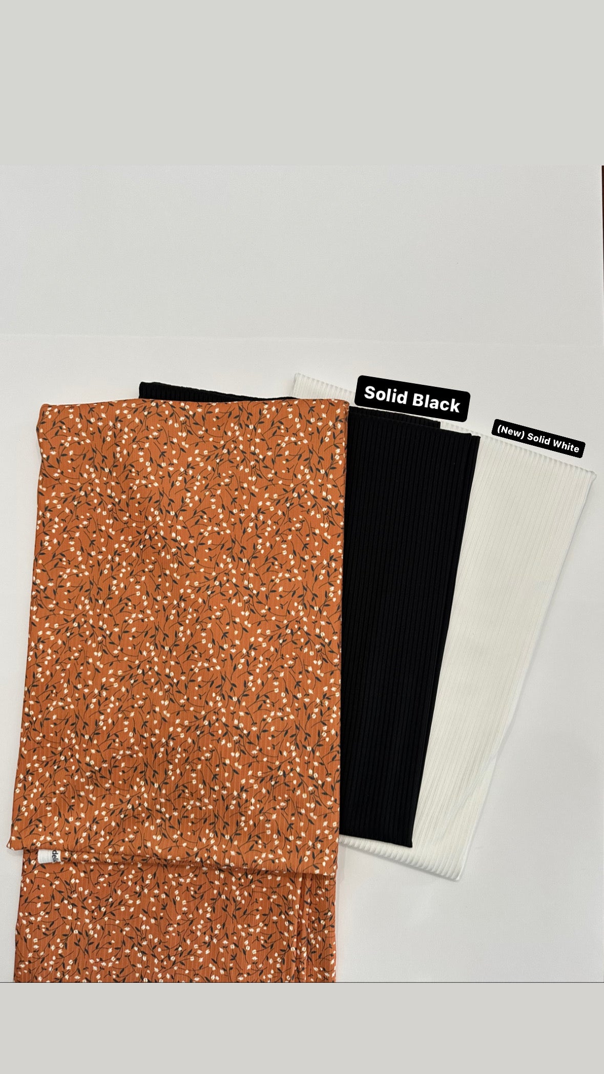 Naomi Floral in Orange Rust on Unbrushed Rib Knit Fabric Sold by the 1/4 yard