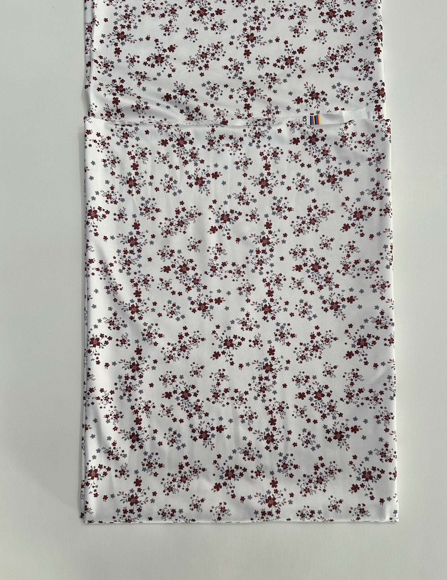Winnie Floral in Light White on DTY Knit Fabric Sold by the 1/4 yard