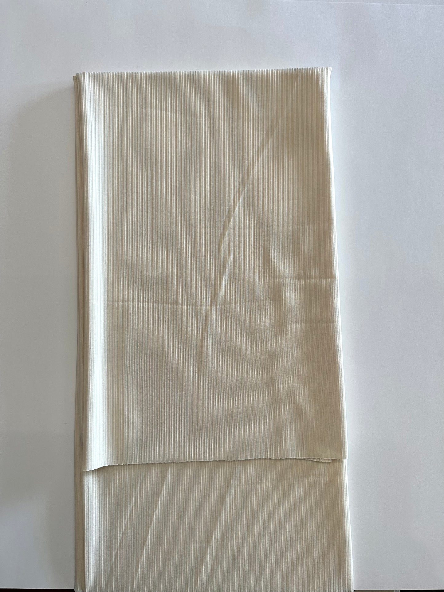 Solid in Cream (new) on Unbrushed Rib Knit Fabric Sold by the 1/4 yard