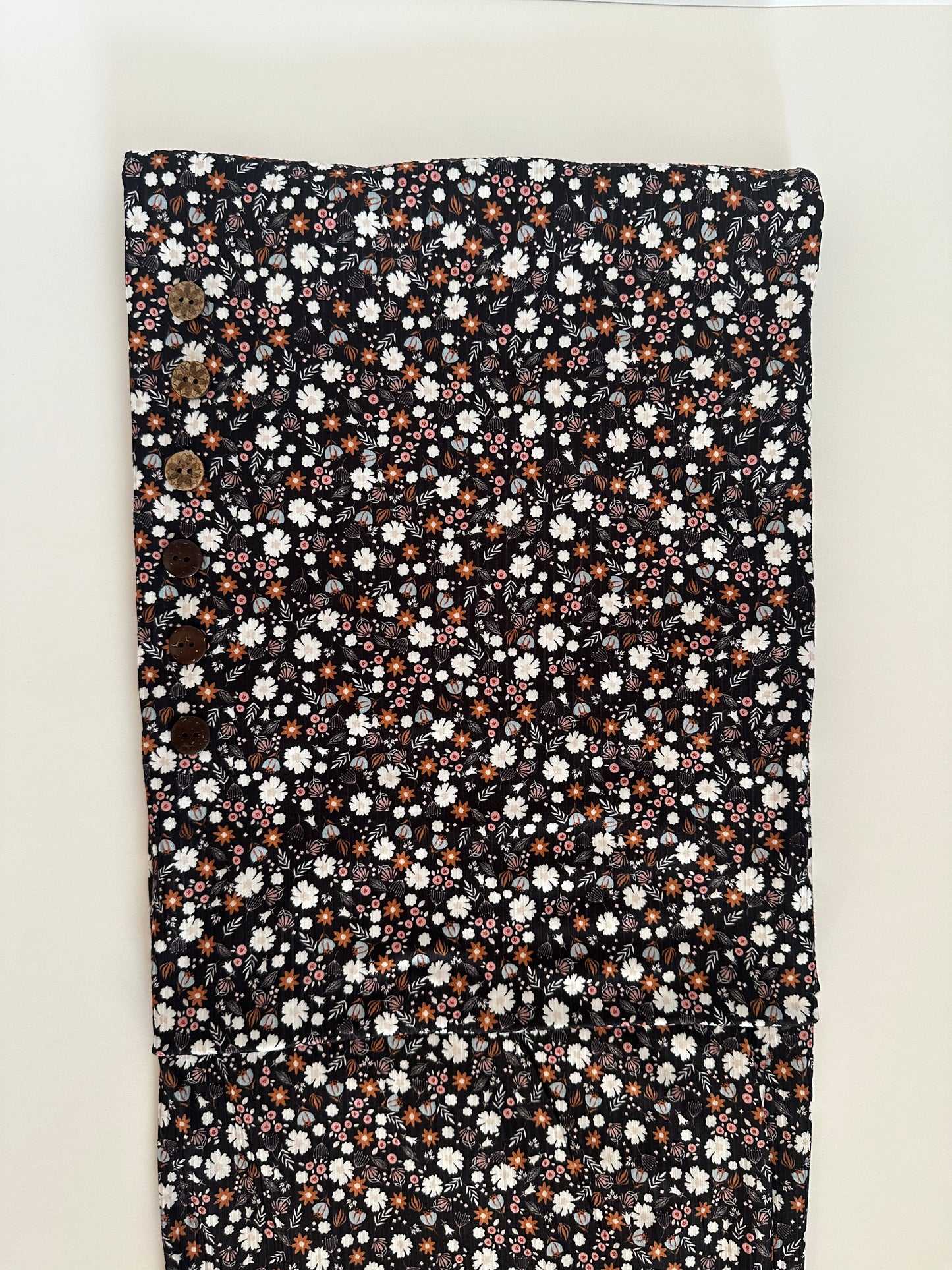Amber Ditsy in Black on Brushed Rib Knit Fabric Sold by the 1/4 yard