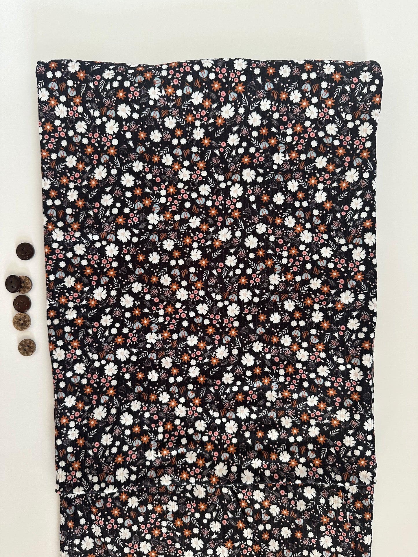 Amber Ditsy in Black on Brushed Rib Knit Fabric Sold by the 1/4 yard