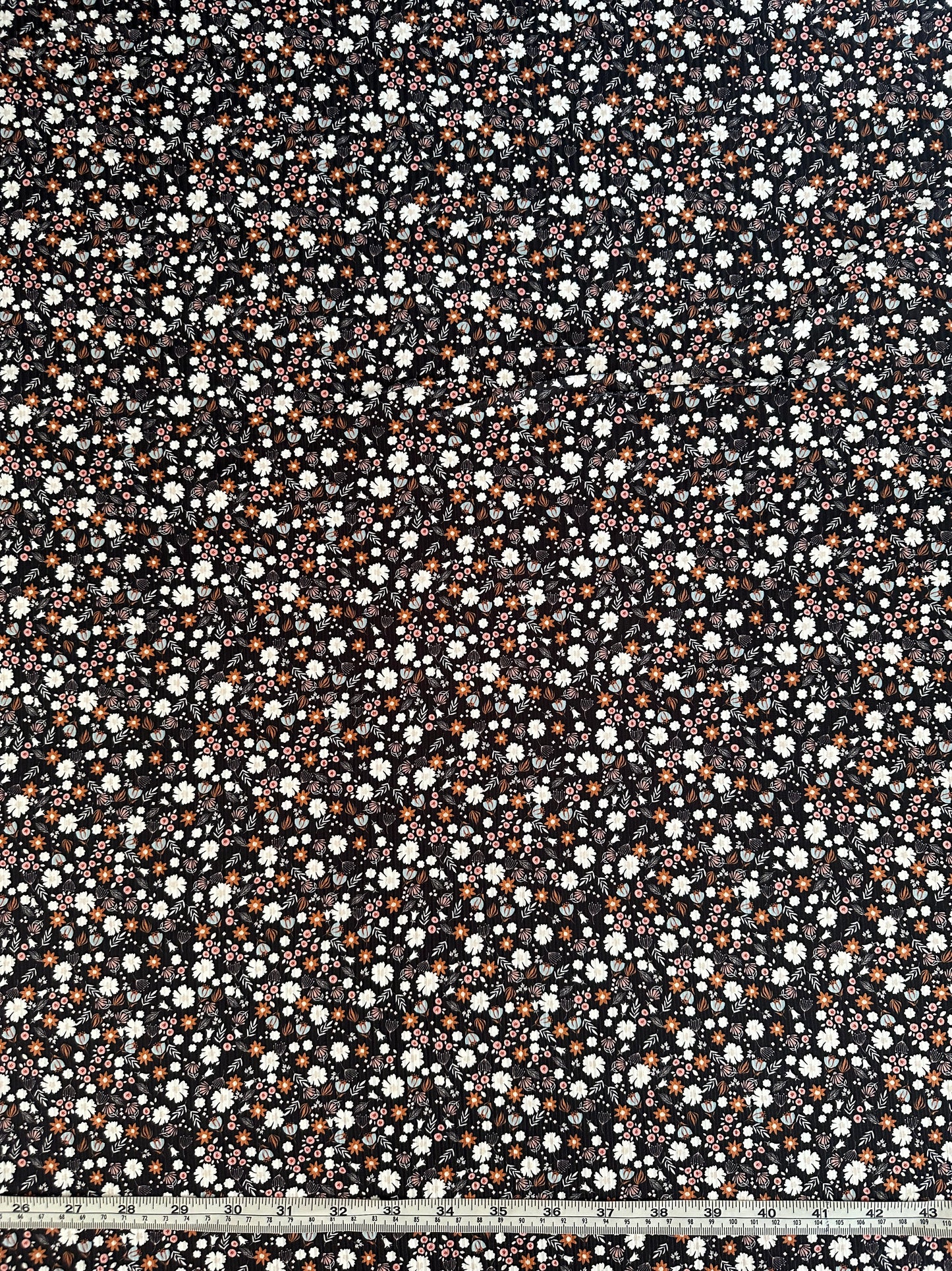 Amber Ditsy in Black on Brushed Rib Knit Fabric Sold by the 1/4 yard