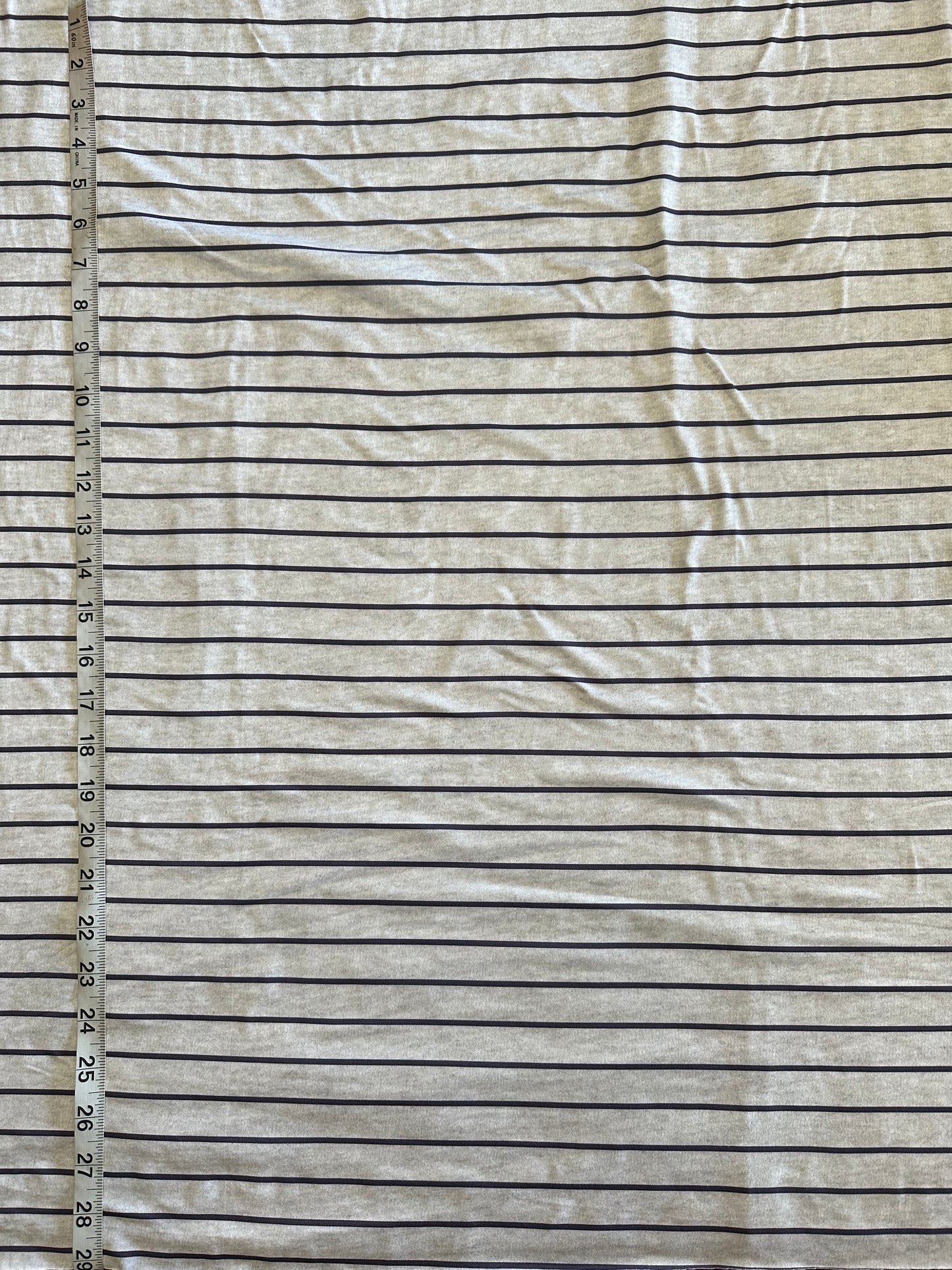 FLAW notice. Indigo Stripes in Heathered Oatmeal with Dusty Purple Stripes on Double Brushed Poly Knit Fabric Sold by the 1/4 yard
