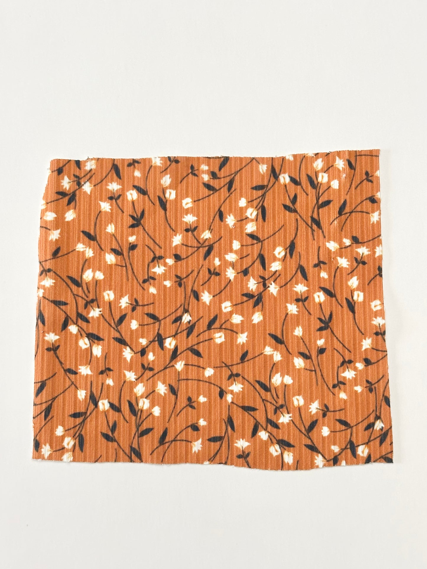 Naomi Floral in Orange Rust on Unbrushed Rib Knit Fabric Sold by the 1/4 yard