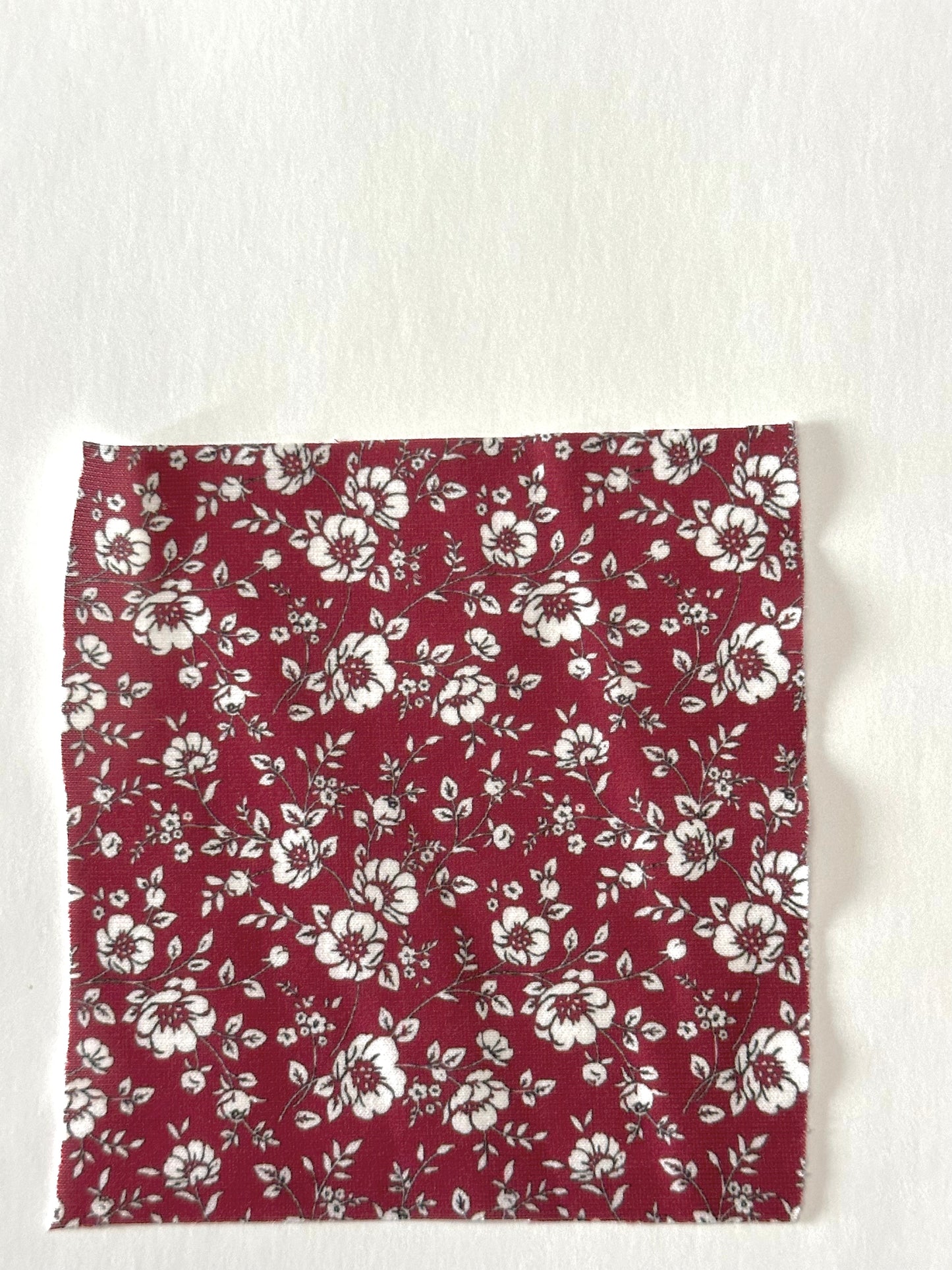 Kezie Floral in Burgundy on Imitation Cotton Jersey Knit Fabric Sold by the 1/4 yard