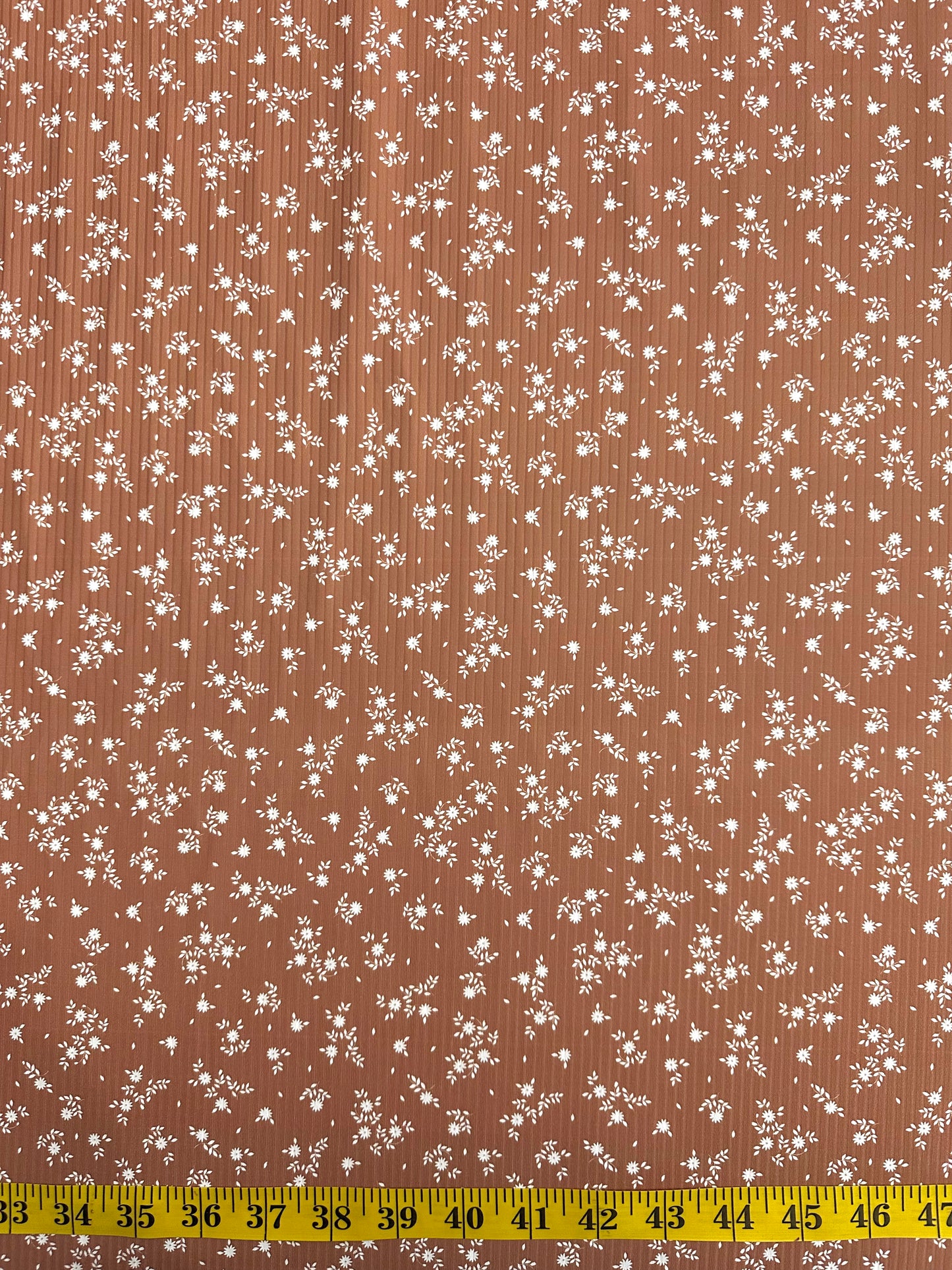 Lacy Floral in Copper Rust on Unbrushed Rib Knit Fabric Sold by the 1/4 yard