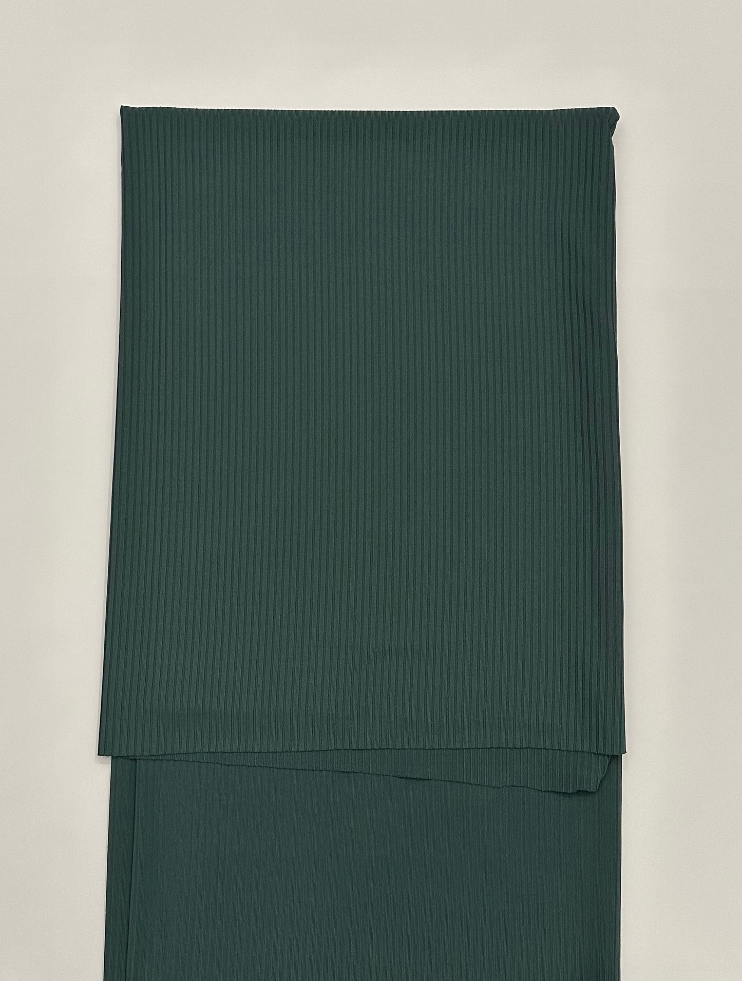 Solid in Evergreen on Unbrushed Rib Knit Fabric Sold by the 1/4 yard