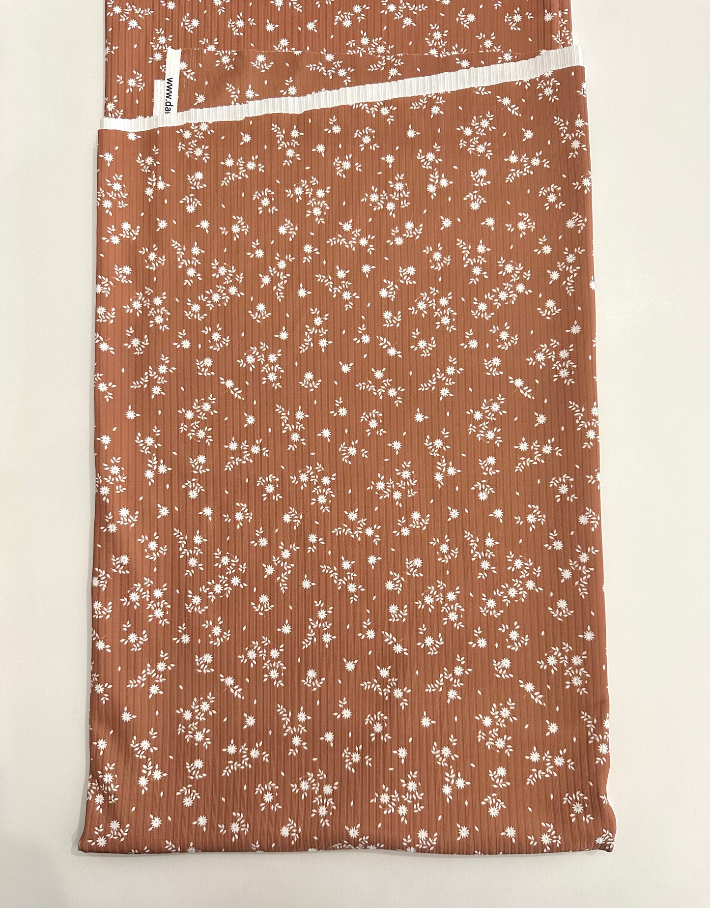 Lacy Floral in Copper Rust on Unbrushed Rib Knit Fabric Sold by the 1/4 yard