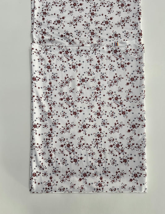 Winnie Floral in Light White on DTY Knit Fabric Sold by the 1/4 yard