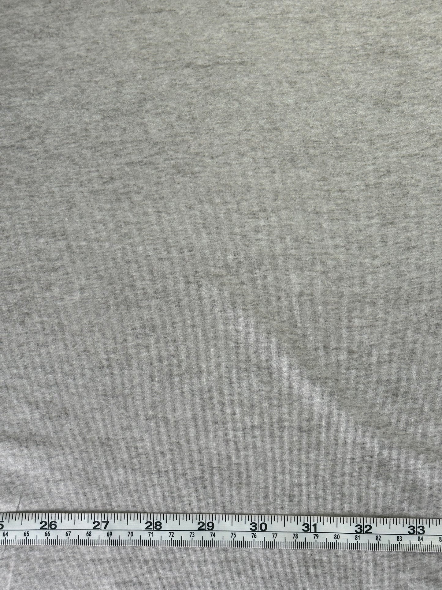 Heathered Solid in Oatmeal on Double Brushed Poly Knit Fabric Sold by the 1/4 yard